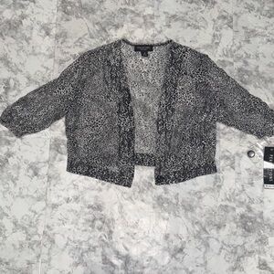 Perceptions Kids Leopard Print cover up sheer fabric. Cute to throw over a tank.